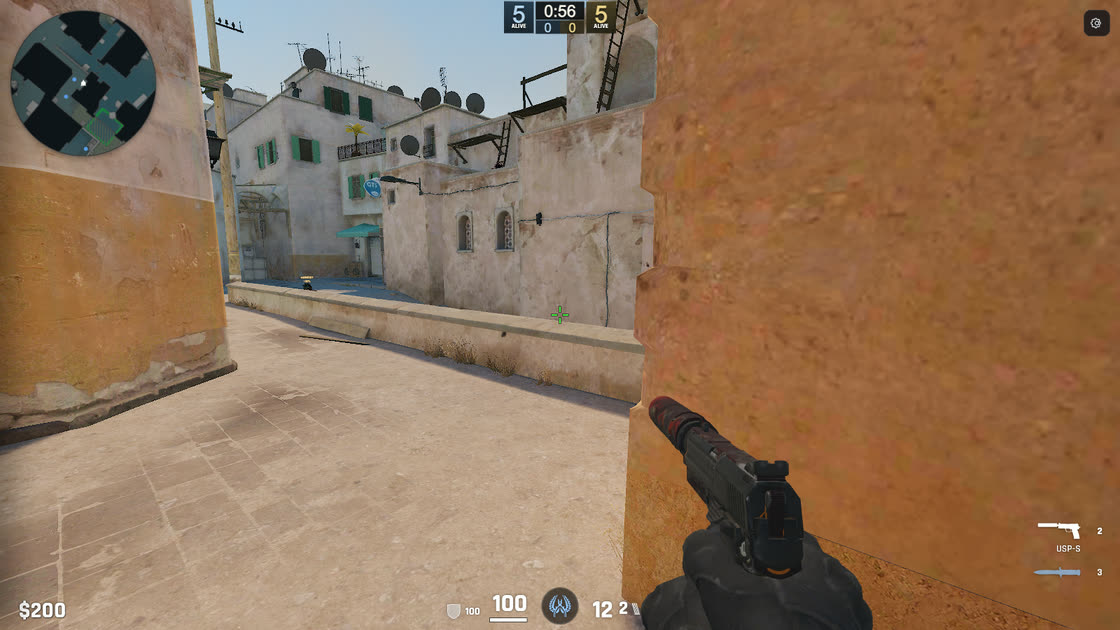 First-person view inside a Replay Moment, holding a USP-S with the CS2 HUD showing health, armour and ammo.